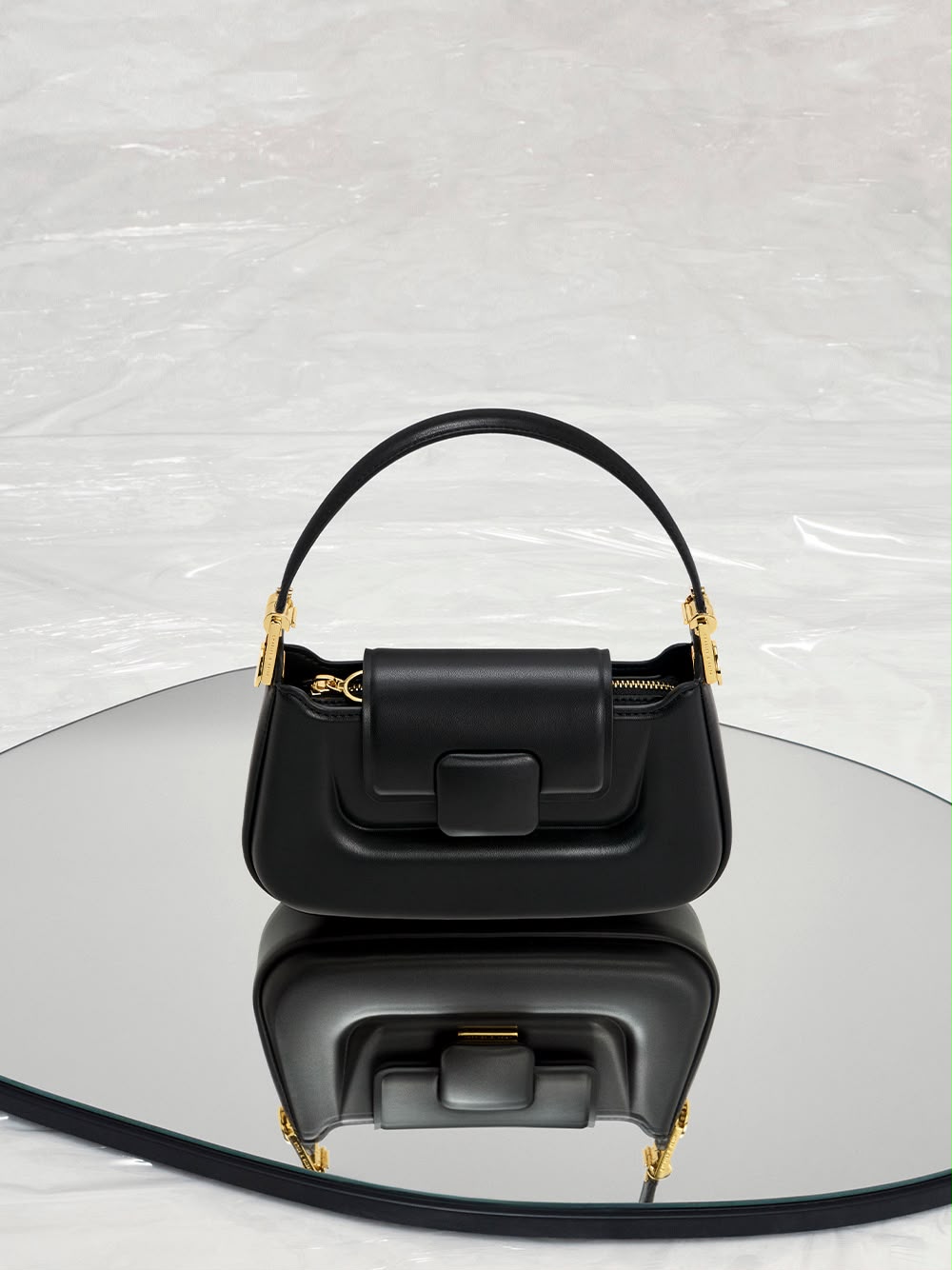 CHARLES & KEITH Curved Front Flap Crossbody Bag